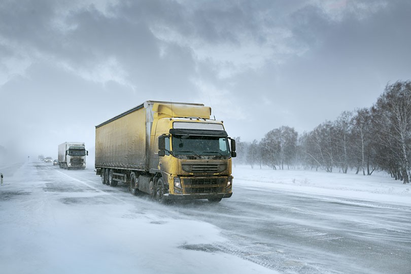 Truck Driving through snow